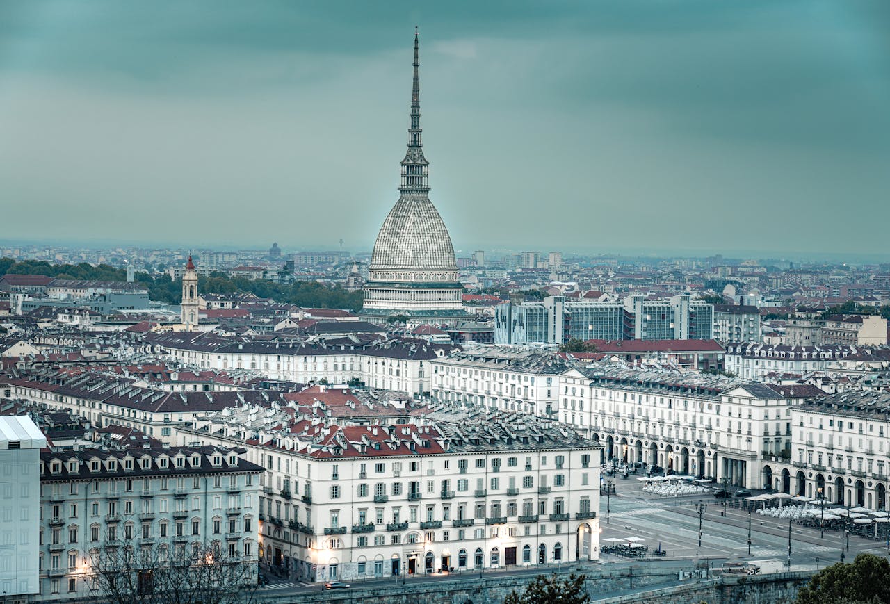 Panoramic view of Turin featuring the iconic Mole Antonelliana, a symbol of the city.